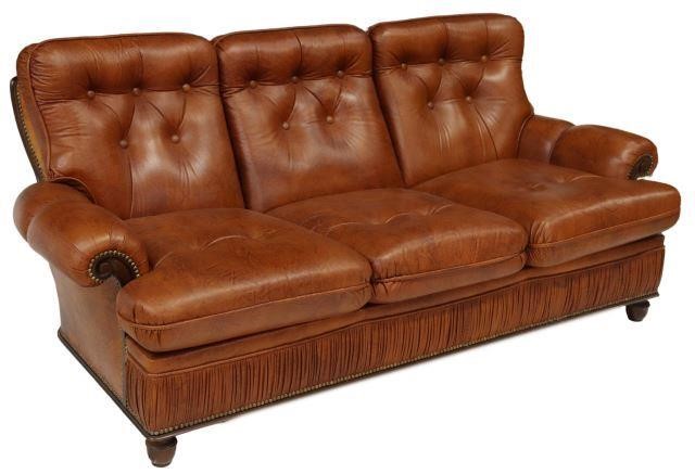 Appraisal: Italian sofa th c in leather upholstery with button-tufted back