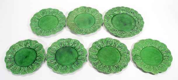 Appraisal: Seven green glazed continental Majolica pottery leaf plates impressed factory