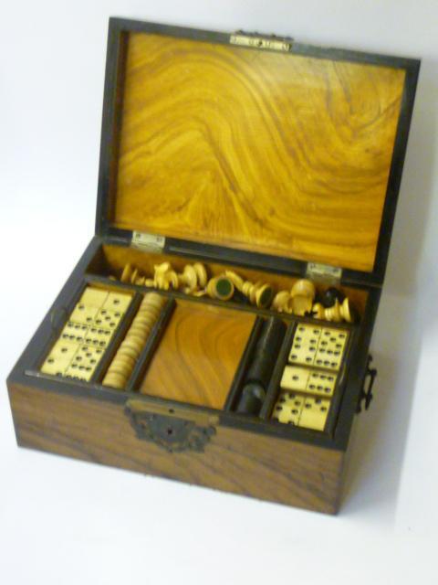 Appraisal: A LATE VICTORIAN WALNUT GAMES COMPENDIUM of oblong form with