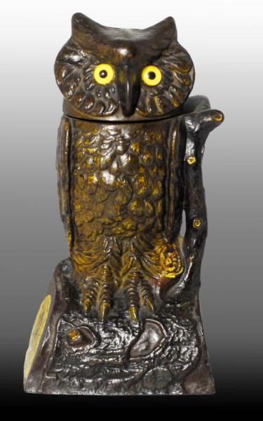 Appraisal: Cast Iron Owl Turning Head Mechanical Bank Description Manufactured by