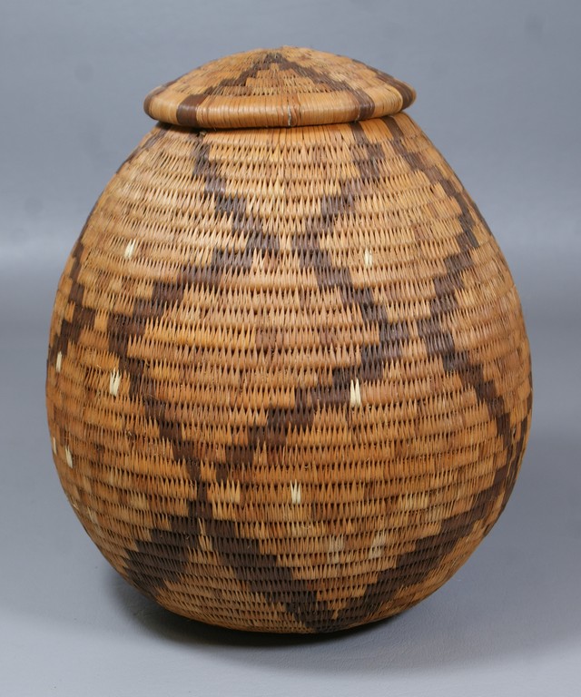 Appraisal: Woven Native American lidded basket brown diamond design with ivory