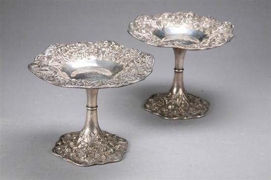 Appraisal: PAIR SILVER COMPOTES No markings Possibly silver plate Ornate embossed