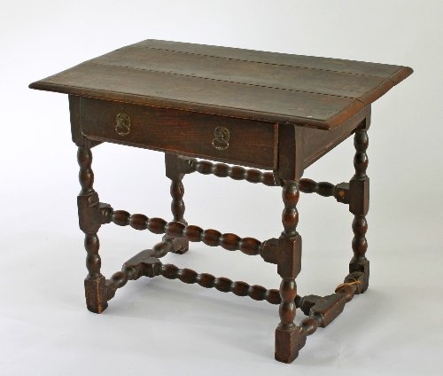 Appraisal: A late Jacobean oak side table fitted a single drawer