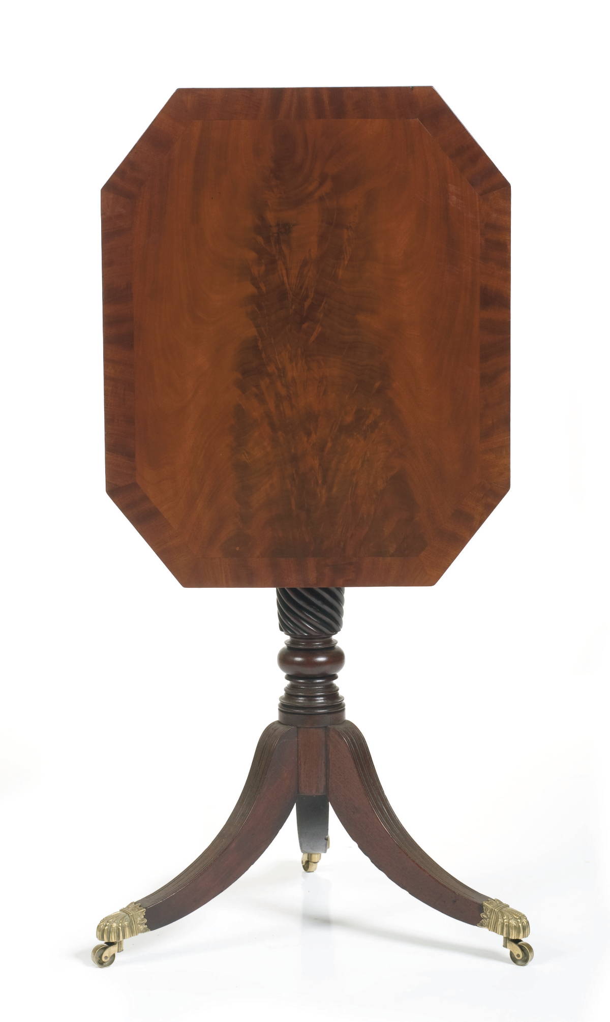 Appraisal: NEW YORK CLASSICAL MAHOGANY TILT-TOP CANDLESTAND The octagonal top tilting