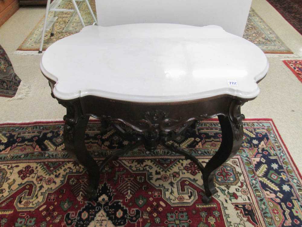 Appraisal: VICTORIAN MARBLE-TOP MAHOGANY CENTER TABLE American th century with conformingly