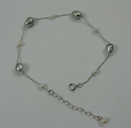 Appraisal: PEARLS AND K WHITE GOLD BRACELET composed of mm Akoya