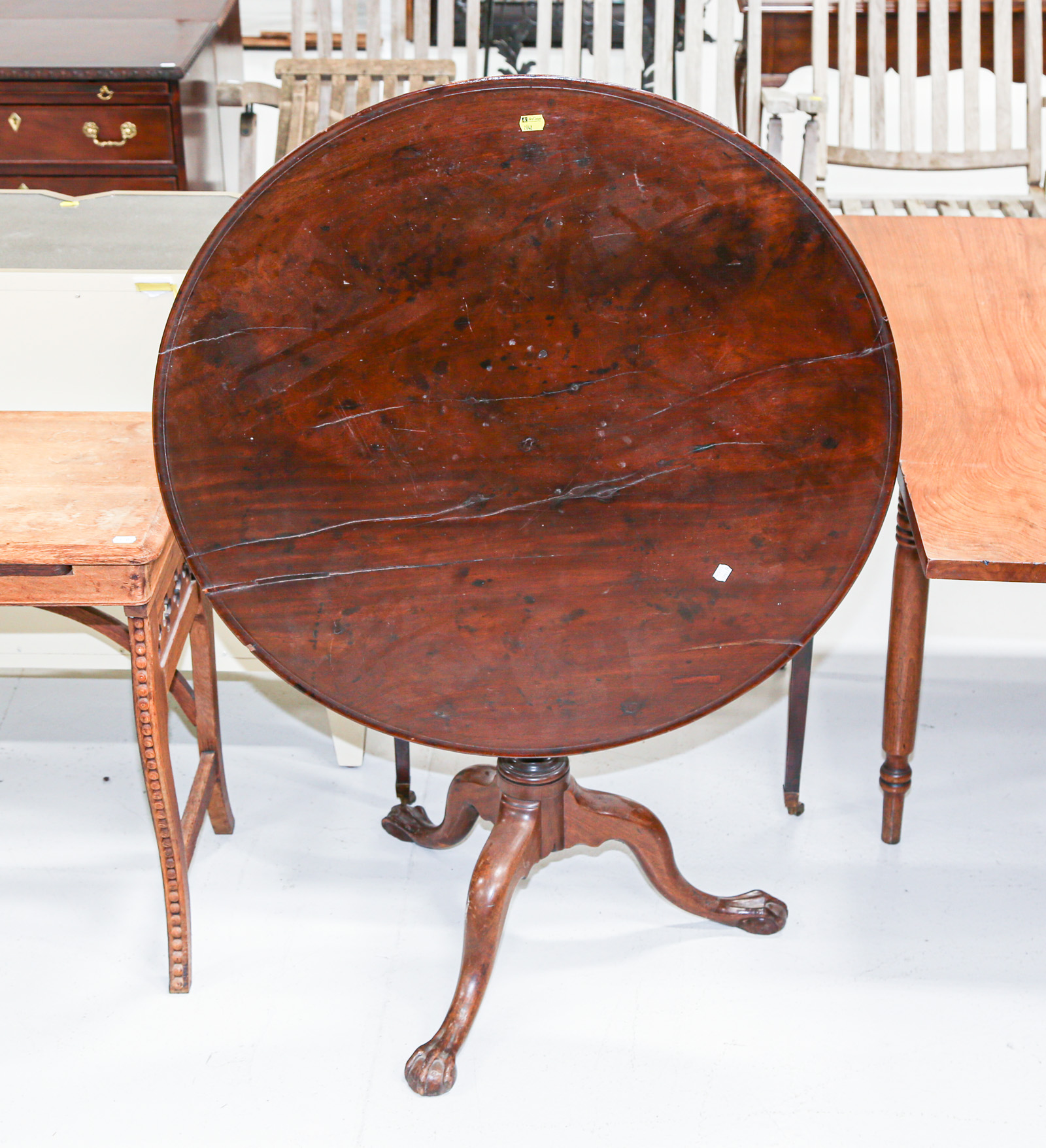 Appraisal: CHIPPENDALE STYLE MAHOGANY TEA TABLE Parts th and th century