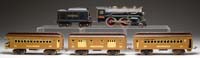 Appraisal: LIONEL STANDARD GAUGE E LOCO MATCHING TENDER AND THREE PASSENGER