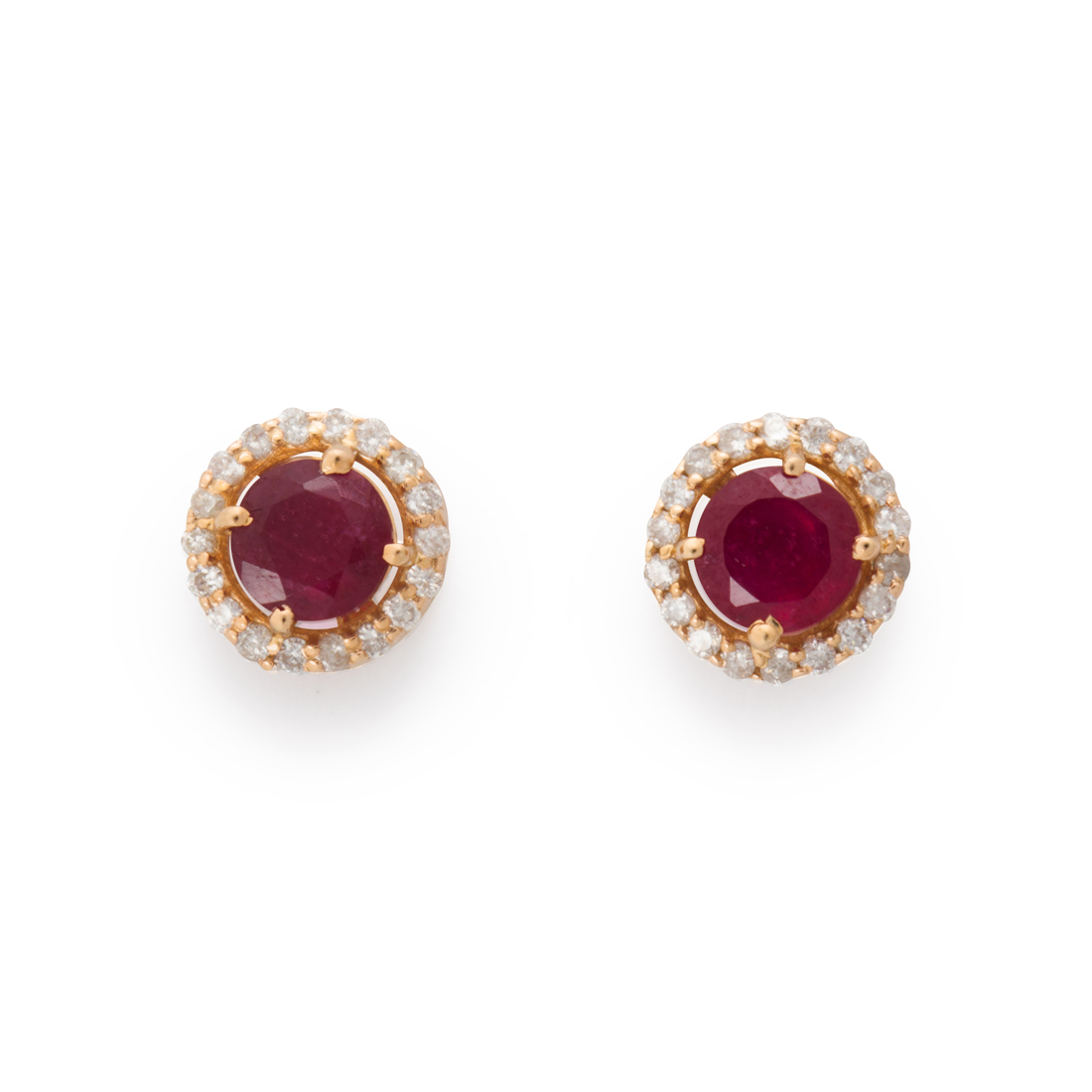 Appraisal: A PAIR OF RUBY DIAMOND AND FOURTEEN KARAT GOLD STUD