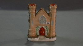 Appraisal: A Staffordshire spill vase of a church damaged cmh