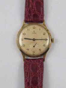 Appraisal: A ct gold gent's wrist watch by Tudor circa with