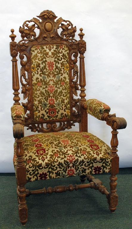 Appraisal: LATE NINETEENTH EARLY TWENTIETH CENTURY CARVED OAK OPEN ARMCHAIR in