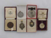 Appraisal: Three silver tennis medals of the s each individually boxed