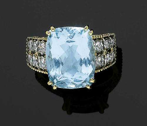 Appraisal: AQUAMARINE AND BRILLIANT-CUT DIAMOND RING Yellow and white gold Decorative