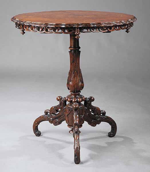 Appraisal: An Antique Continental Walnut Marquetry Center Table the shaped top