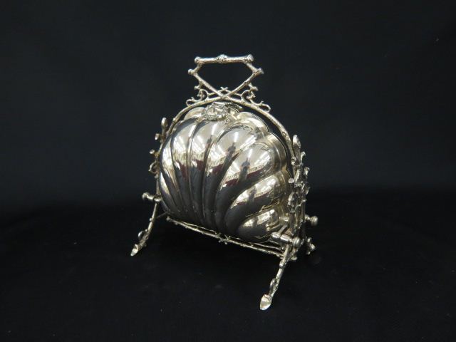 Appraisal: Silverplate Mechanical Bun Warmer shell shape basket style with elaborate