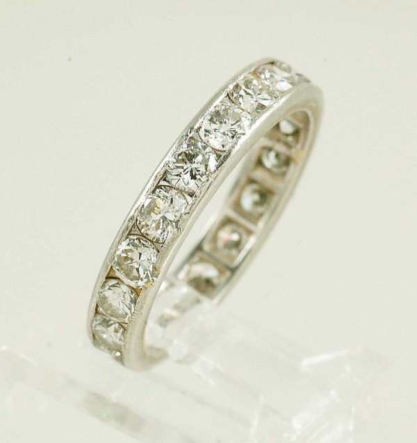 Appraisal: Platinum eternity band channel set with nineteen carat early round