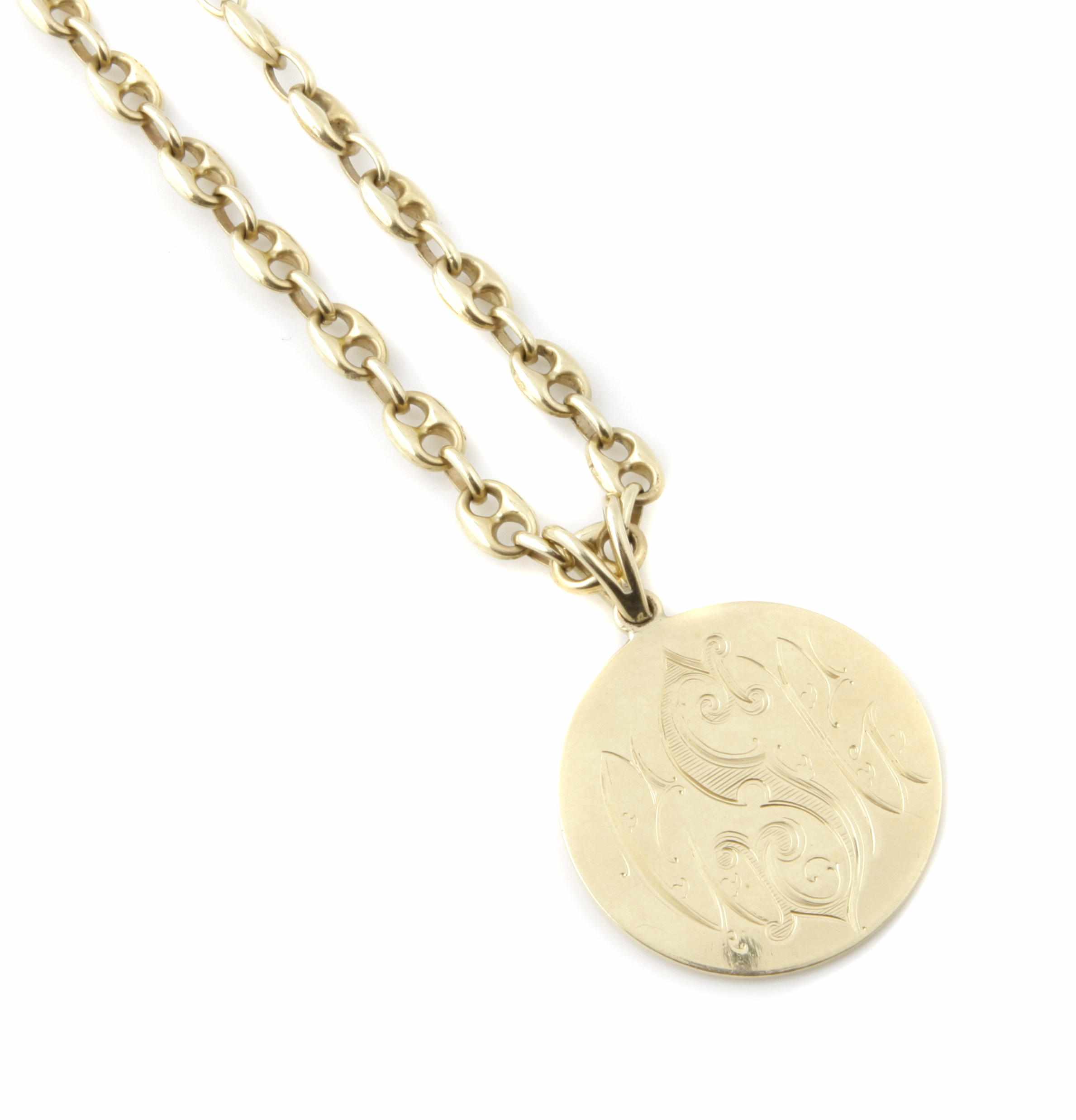 Appraisal: A k gold medallion pendant with chain length in g