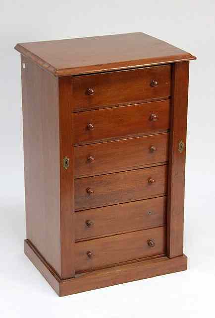 Appraisal: A Victorian mahogany Wellington chest the six drawers secured by