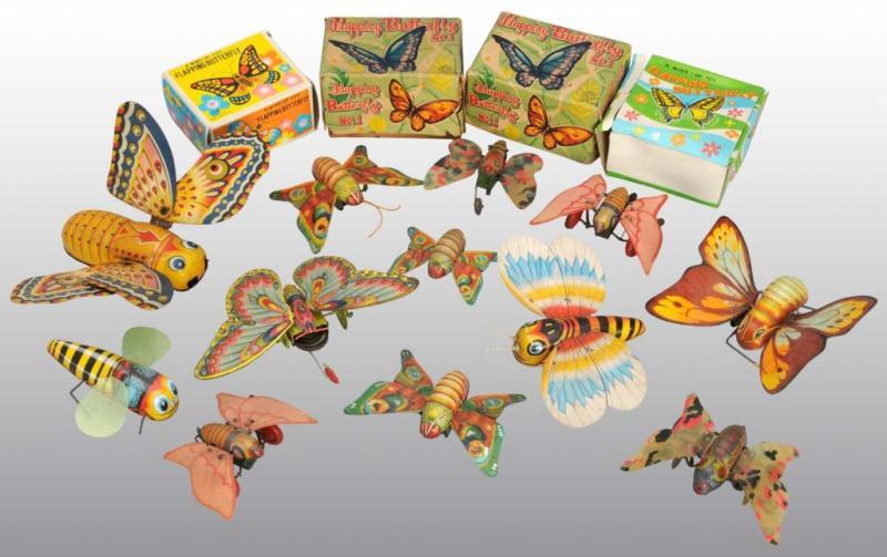 Appraisal: Lot of Tin Butterfly Toys Description Working Includes some with