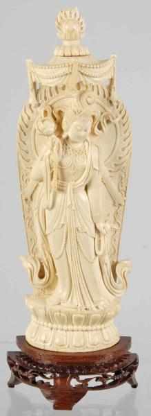 Appraisal: Carved Ivory Lady Description Carved ivory lady holding a flower