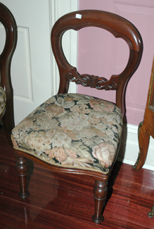 Appraisal: A PAIR OF VICTORIAN CEDAR DINING CHAIRS Each with buttoned