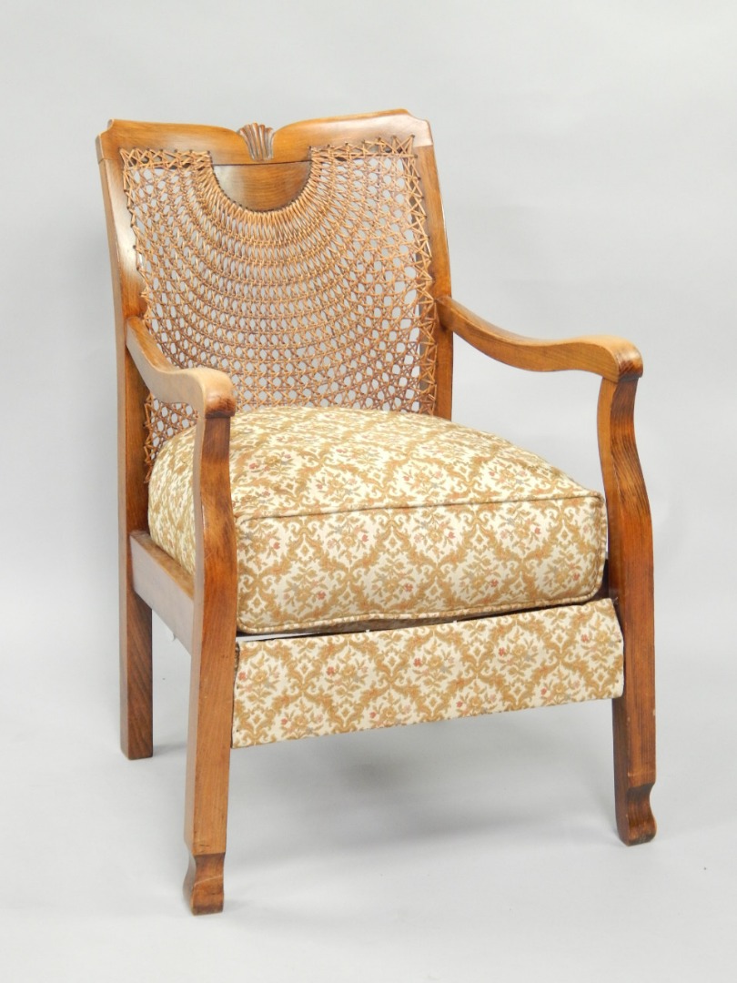 Appraisal: A s beech framed open armchair with woven cane back