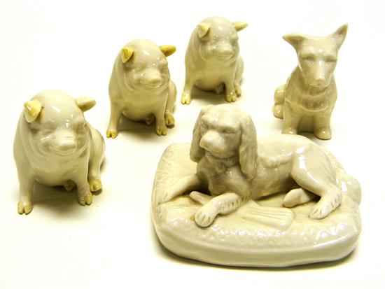 Appraisal: Five green mark Belleek figures including three pigs a seated