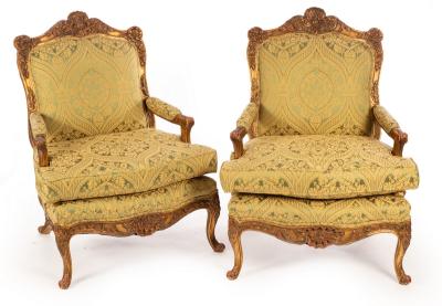 Appraisal: A pair of Louis XIV style gilt framed armchairs with