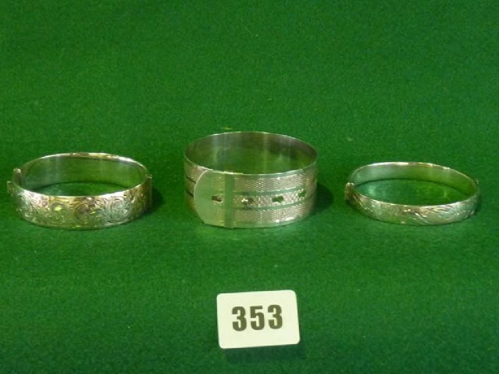 Appraisal: A silver bangle stamped sterling in the form of a