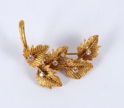 Appraisal: An ct gold and diamond leaf spray brooch BRLd set