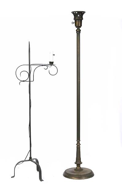 Appraisal: A group of four patinated metal floor lamps height of