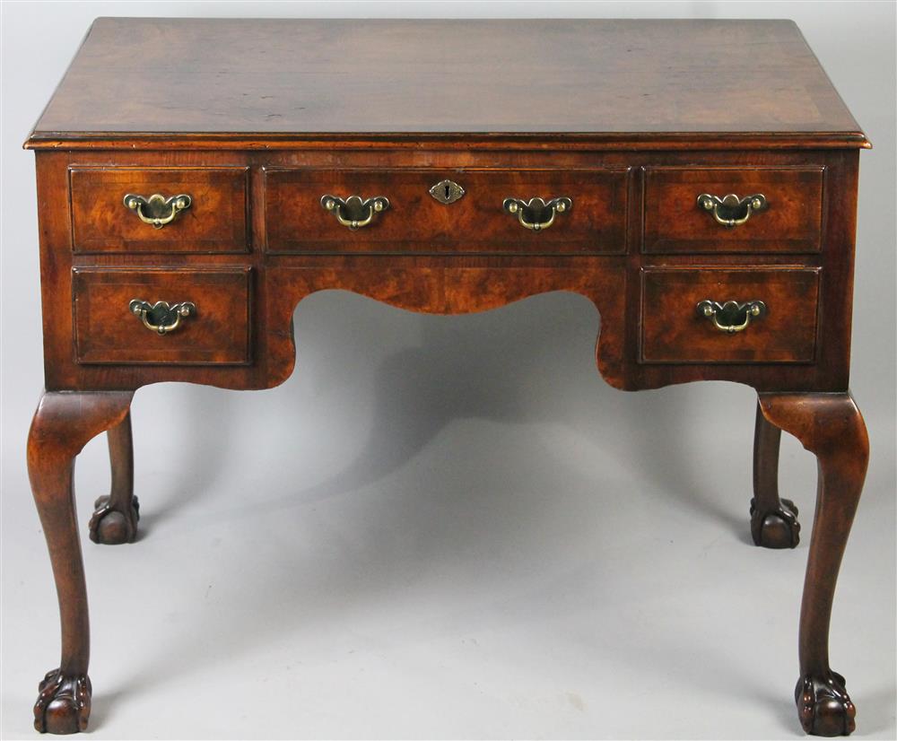 Appraisal: CHIPPENDALE STYLE WALNUT DRESSING TABLE having a rectangular top with