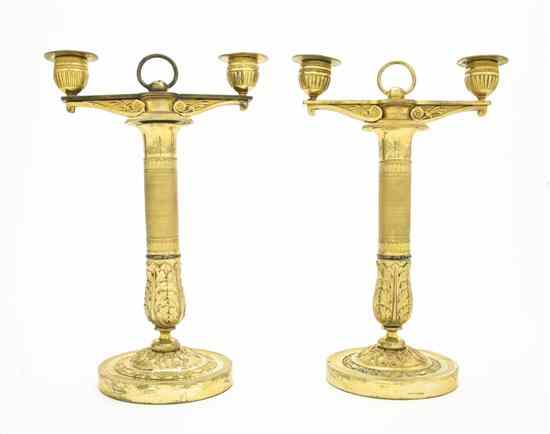 Appraisal: A Pair of Neoclassical Gilt Metal Two-Light Candelabra each having