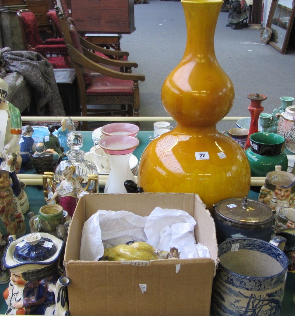 Appraisal: A quantity of ceramics including a faience pottery bird modelled