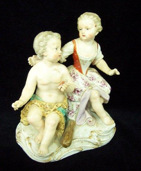 Appraisal: A Meissen figural group Children dressed as Hercules and Omphale