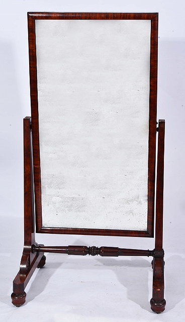 Appraisal: A VICTORIAN MAHOGANY CHEVAL MIRROR with rectangular plate and fluted