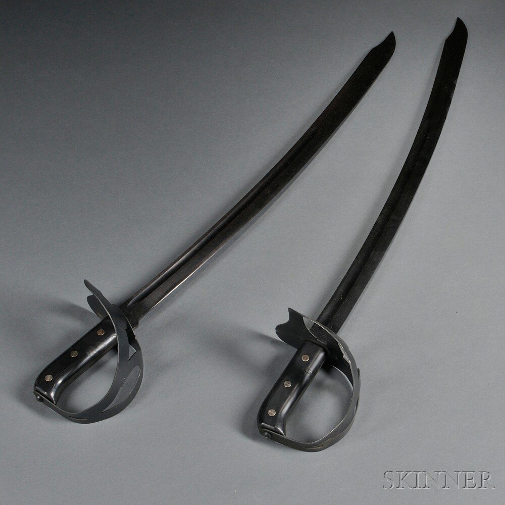 Appraisal: Two Dutch Klewang Cutlasses c early th century black plastic