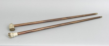 Appraisal: A Lot of Two Walking Sticks with Decorative Handles A