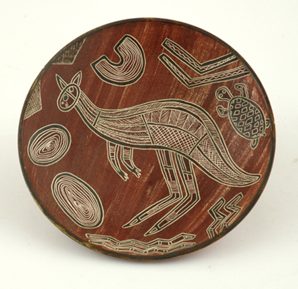 Appraisal: CARL COOPER Victoria circa Circular earthenware dish decorated with indigenous