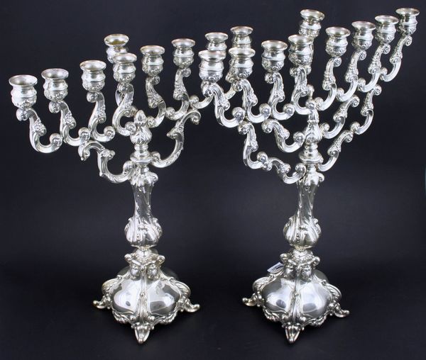 Appraisal: Pair of mid th Century sterling silver menorahs marked ozt