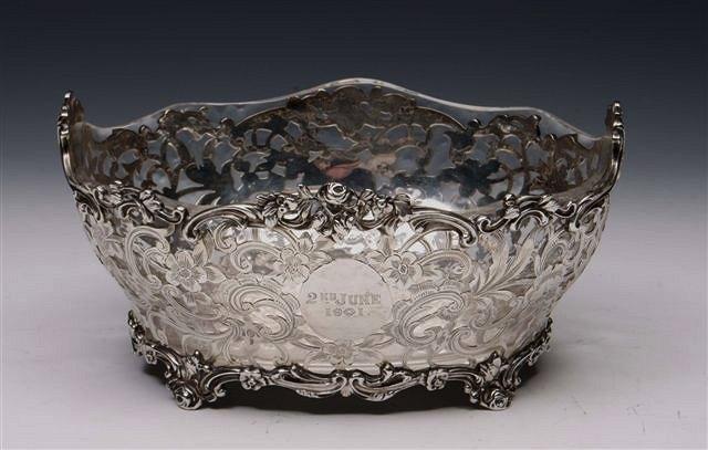 Appraisal: A LATE VICTORIAN SILVER BASKET with pierced scroll and flower