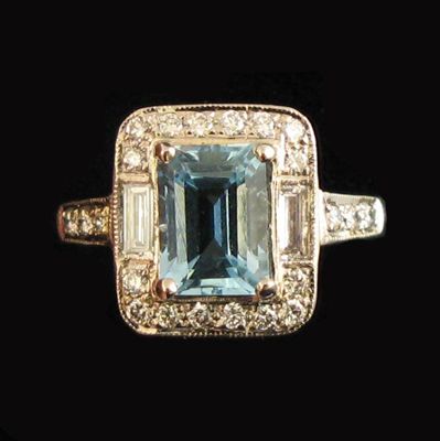 Appraisal: An aquamarine and diamond ring the emerald cut aquamarine is