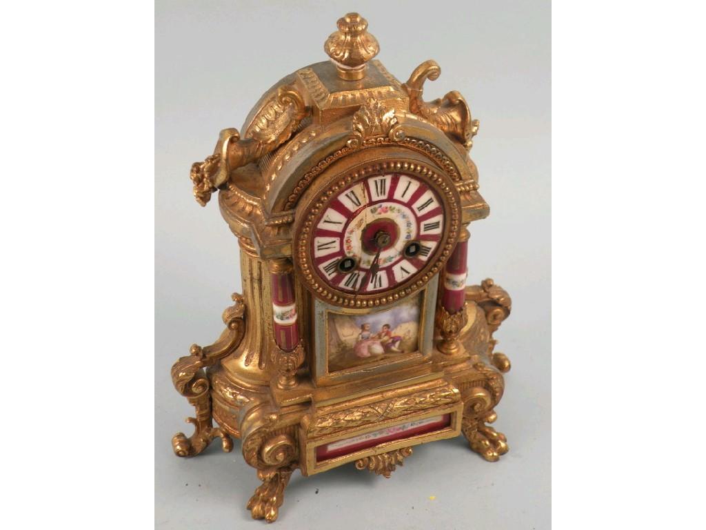 Appraisal: A late thC Continental gilt metal mantel clock the porcelain