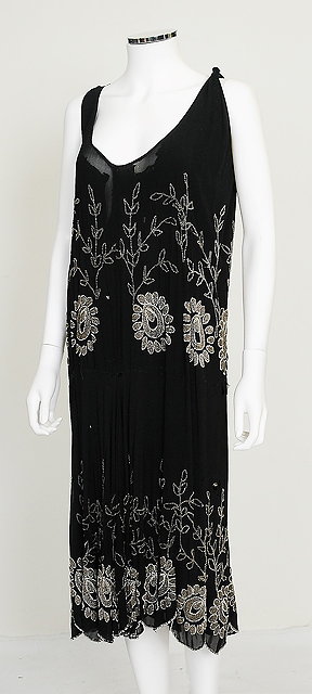 Appraisal: A s black chiffon flapper dress with beaded floral design