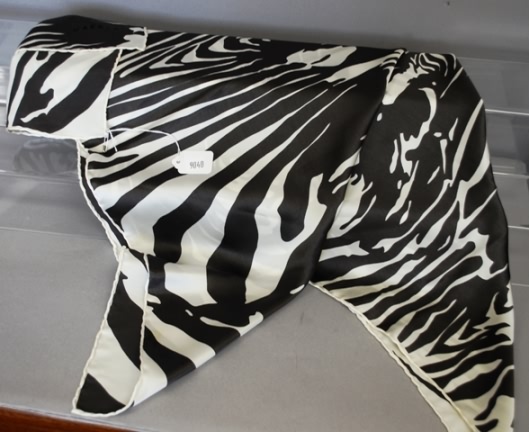 Appraisal: Jaeger black white silk scarf with zebra design Approx size