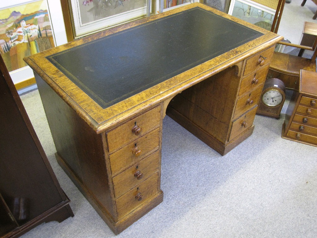 Appraisal: Oak twin pedestal desk with leather inset top