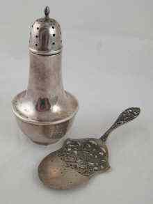 Appraisal: A silver cased bakelite sugar caster Birmingham together with a