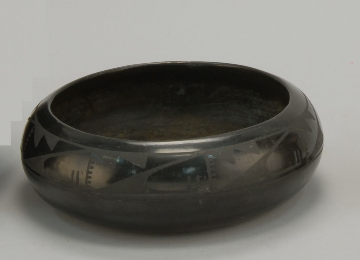 Appraisal: SAN ILDEFONSO BLACK-ON-BLACK POTTERY BOWL th CenturyWith whale design about