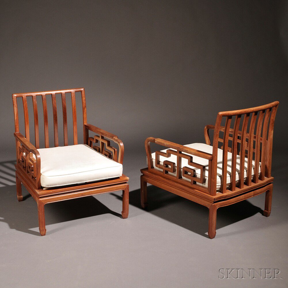 Appraisal: Pair of Mid-Century Modern Asian-inspired Lounge Chairs Hardwood upholstery and